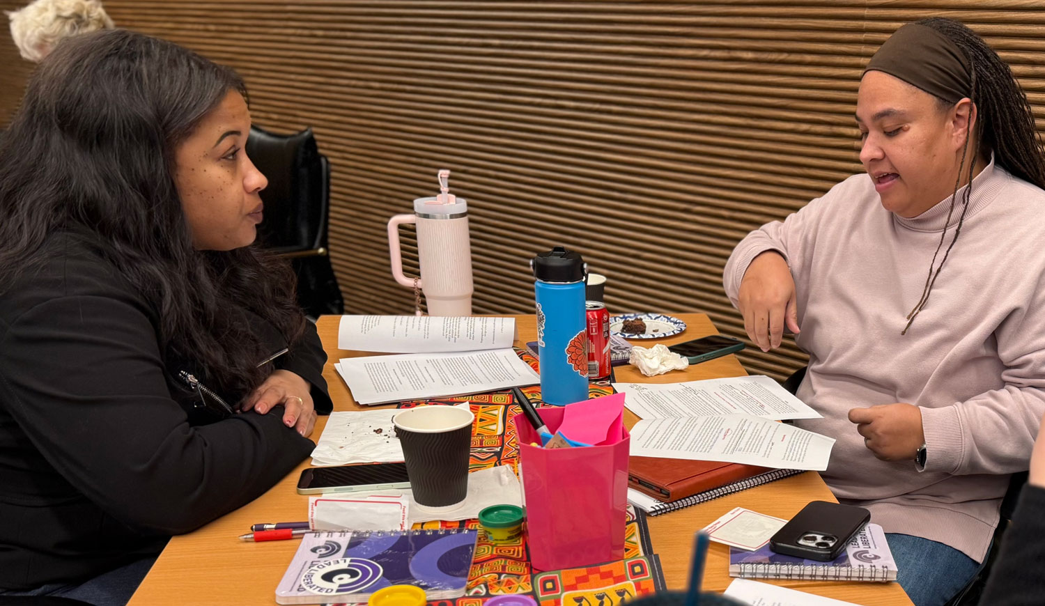 two people working at a desk
